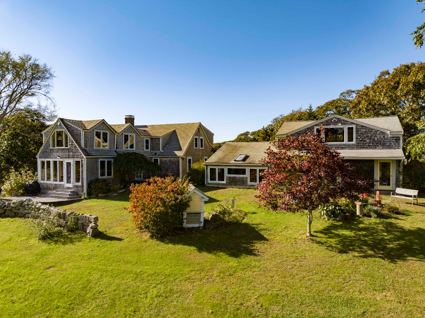 76 State Road Chilmark, MA 02535 - Photo 3 of 79 a front view of a house with a yard