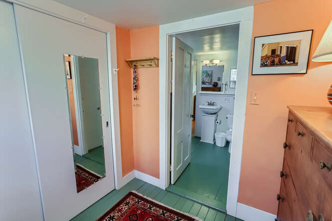 76 State Road Chilmark, MA 02535 - Photo 32 of 79 a view of a hallway with bathroom and mirror