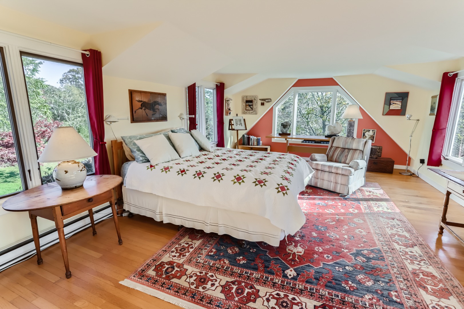 76 State Road Chilmark, MA 02535 - Photo 36 of 79 a bedroom with a bed a large window with table and chair