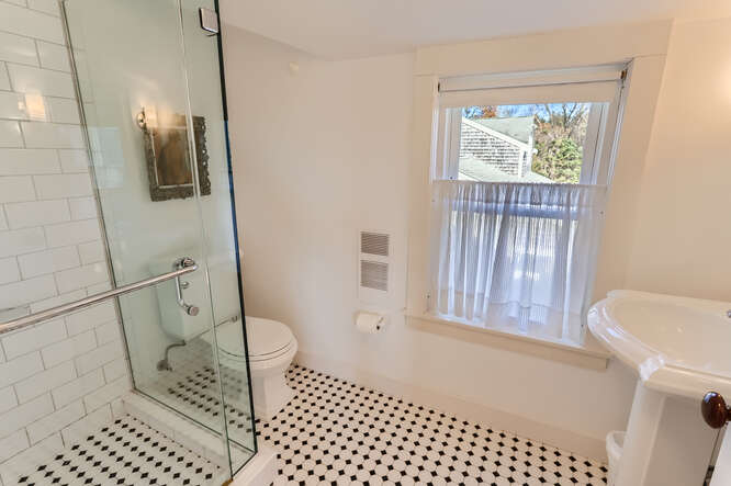 76 State Road Chilmark, MA 02535 - Photo 39 of 79 a bathroom with a sink toilet and shower