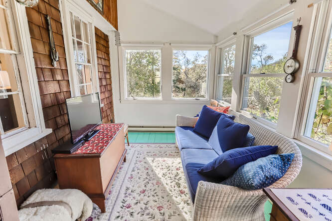 76 State Road Chilmark, MA 02535 - Photo 48 of 79 a living room with furniture and a window