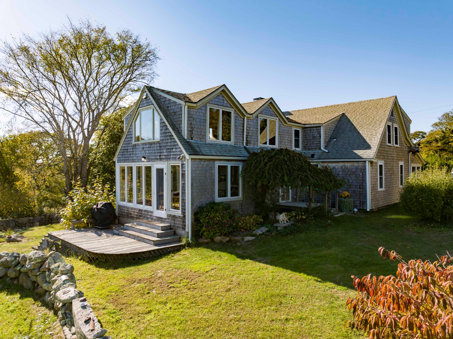 76 State Road Chilmark, MA 02535 - Photo 5 of 79 a front view of a house with garden