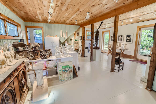 76 State Road Chilmark, MA 02535 - Photo 51 of 79 a view of a livingroom with furniture and a flat screen tv