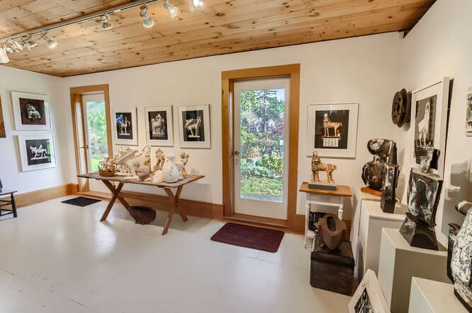 76 State Road Chilmark, MA 02535 - Photo 55 of 79 a living room with furniture and a flat screen tv