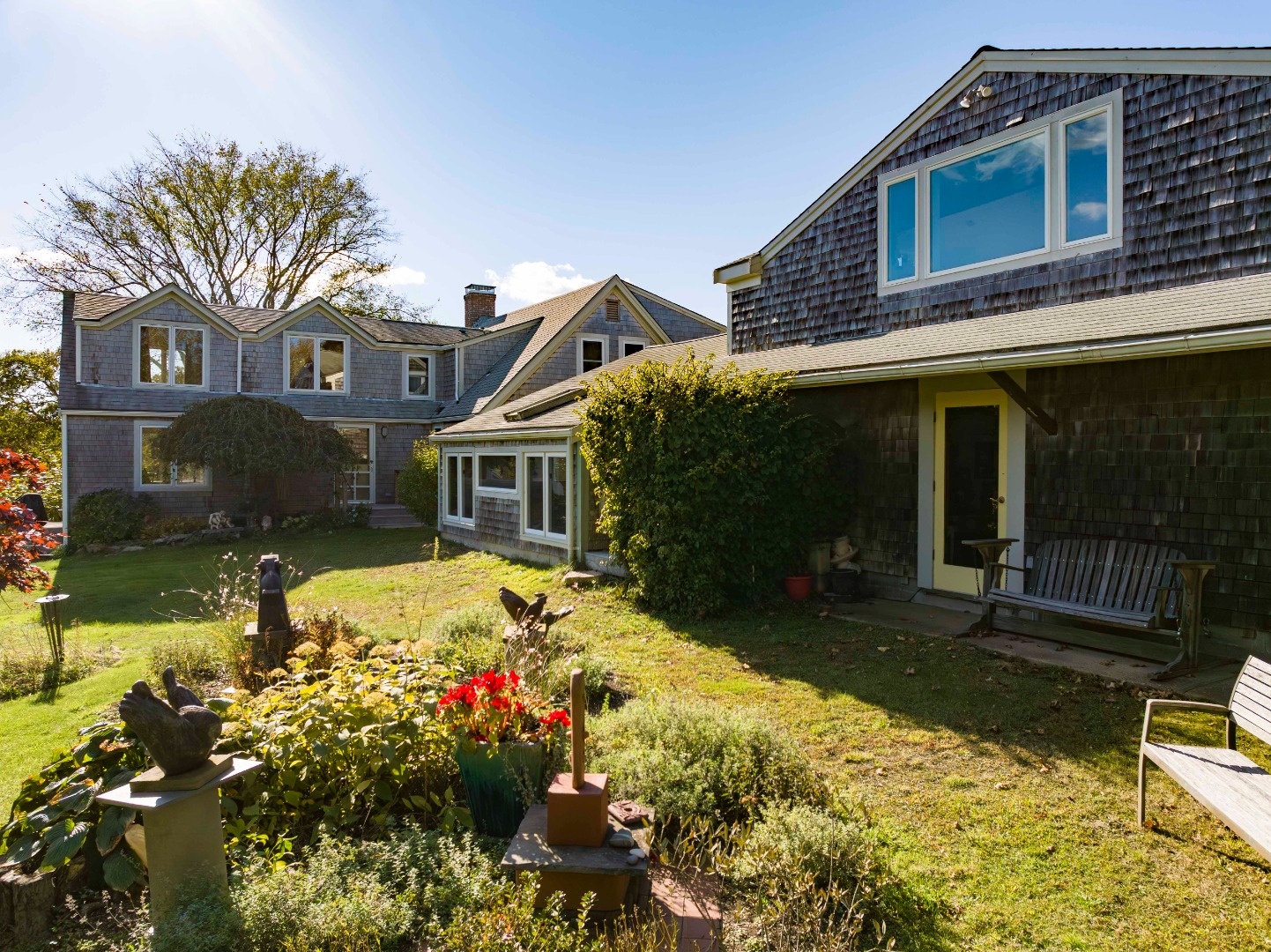 76 State Road Chilmark, MA 02535 - Photo 6 of 79 a front view of a house with a yard
