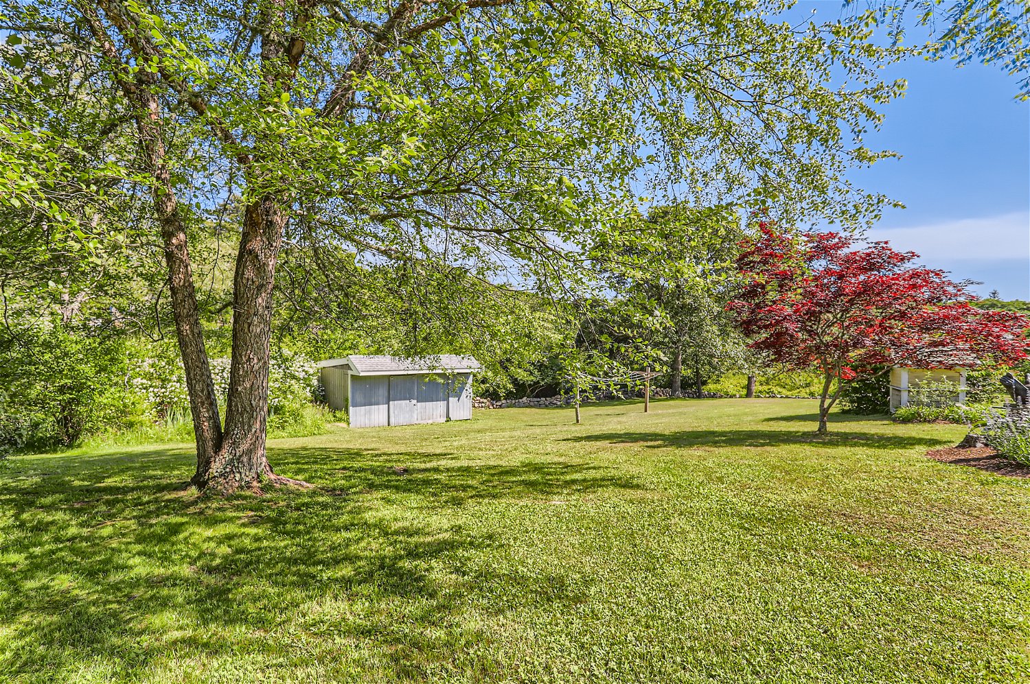 76 State Road Chilmark, MA 02535 - Photo 77 of 79 a view of a house with a big yard