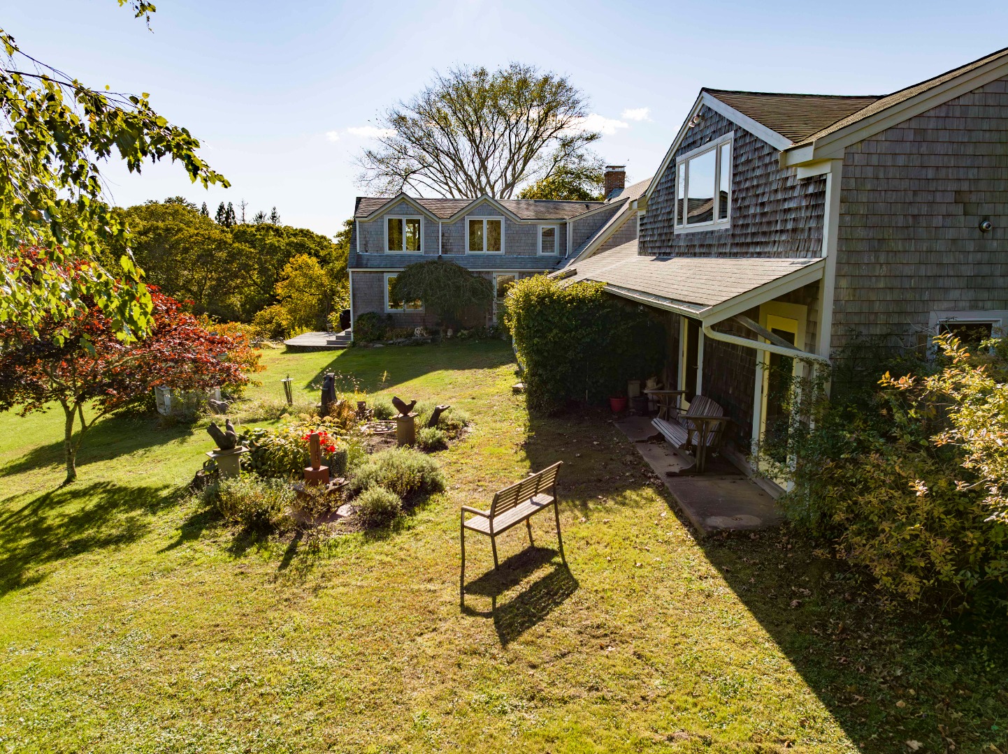 76 State Road Chilmark, MA 02535 - Photo 8 of 79 a front view of a house with a yard