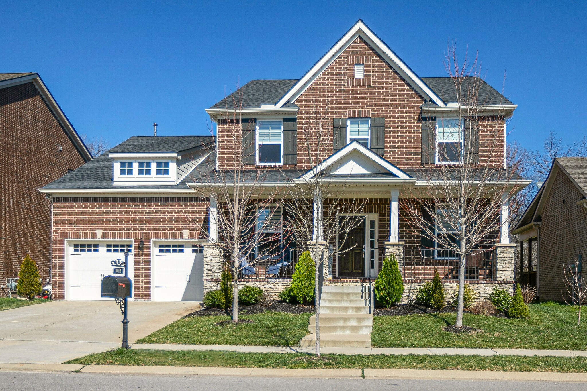 902 Beamon Drive Franklin, TN 37064 - Photo 1 of 41 a front view of a house with a yard