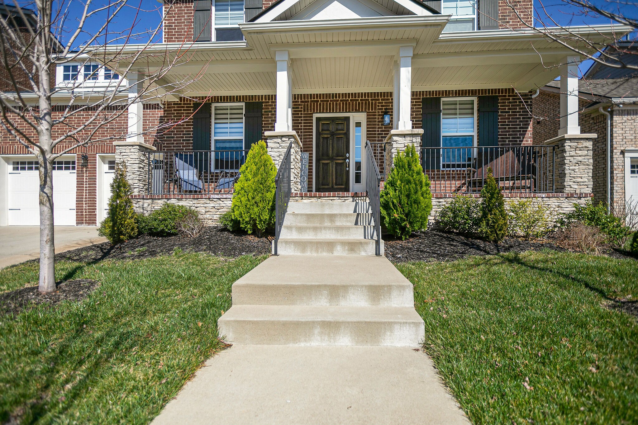 902 Beamon Drive Franklin, TN 37064 - Photo 4 of 41 a front view of a house with garden