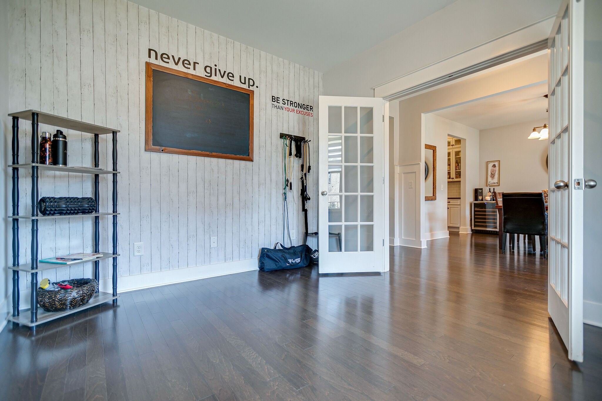 902 Beamon Drive Franklin, TN 37064 - Photo 8 of 41 a hallway with wooden floor and windows