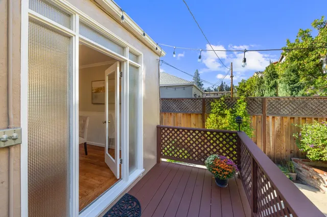 a view of a porch with wooden floor