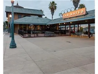 a view of a house with a small garden