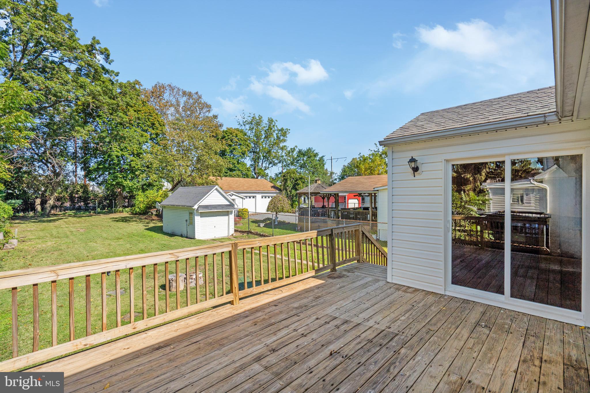2114 Oakland Road Baltimore, MD 21220 - Photo 17 of 21 a view of a house with a balcony