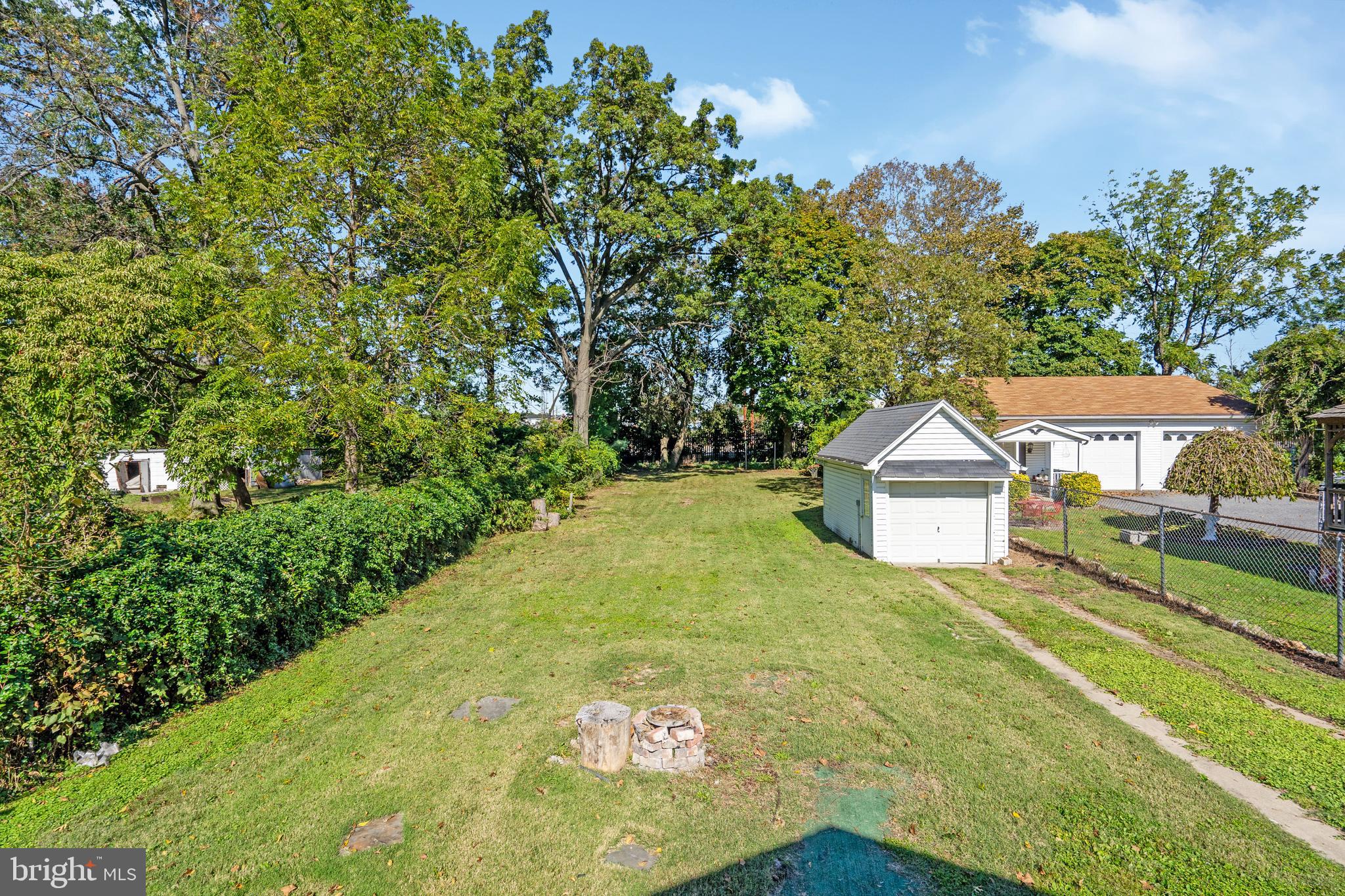 2114 Oakland Road Baltimore, MD 21220 - Photo 18 of 21 a view of a house with a yard