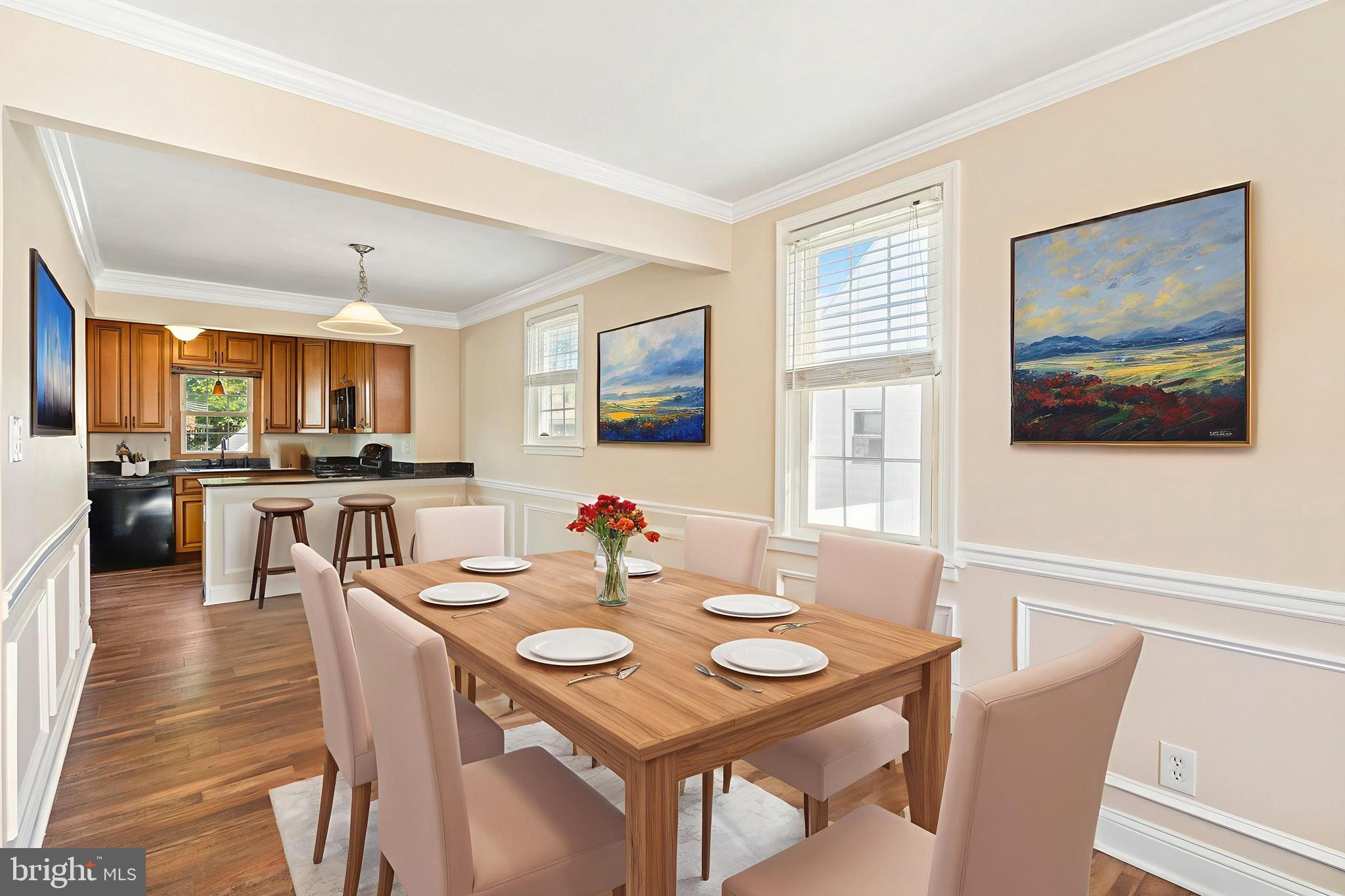 2114 Oakland Road Baltimore, MD 21220 - Photo 4 of 21 a view of a dining room with furniture window and wooden floor