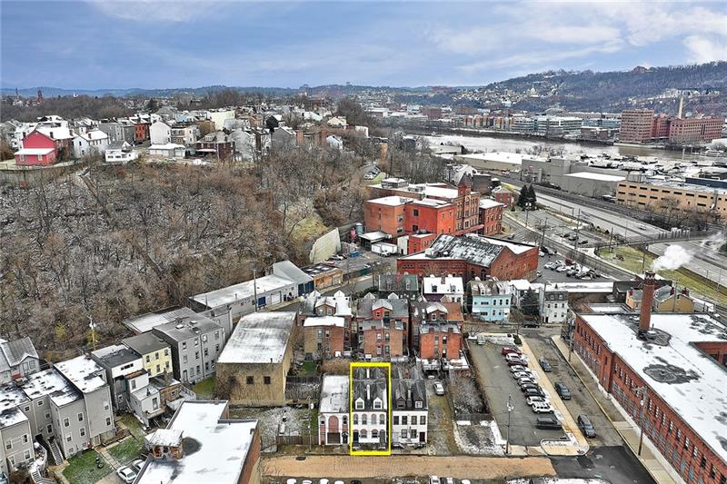 3-4 Rickenbach Street Pittsburgh, PA 15212 - Photo 4 of 21 The duplex is picture here at the foot of Troy Hill as well as the Strip District right across the river. The yellow lines do not depict actual property boundaries.
