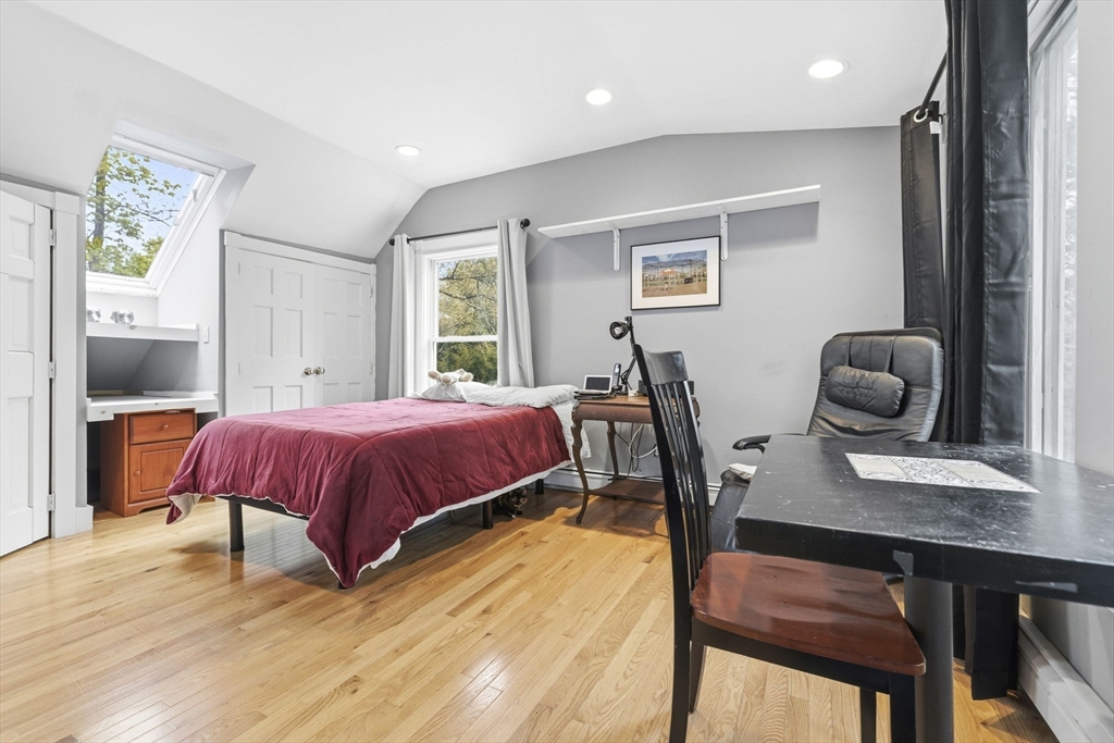17 Wellesley Street Weston, MA 02493 - Photo 21 of 30 a spacious bedroom with a bed and wooden floor