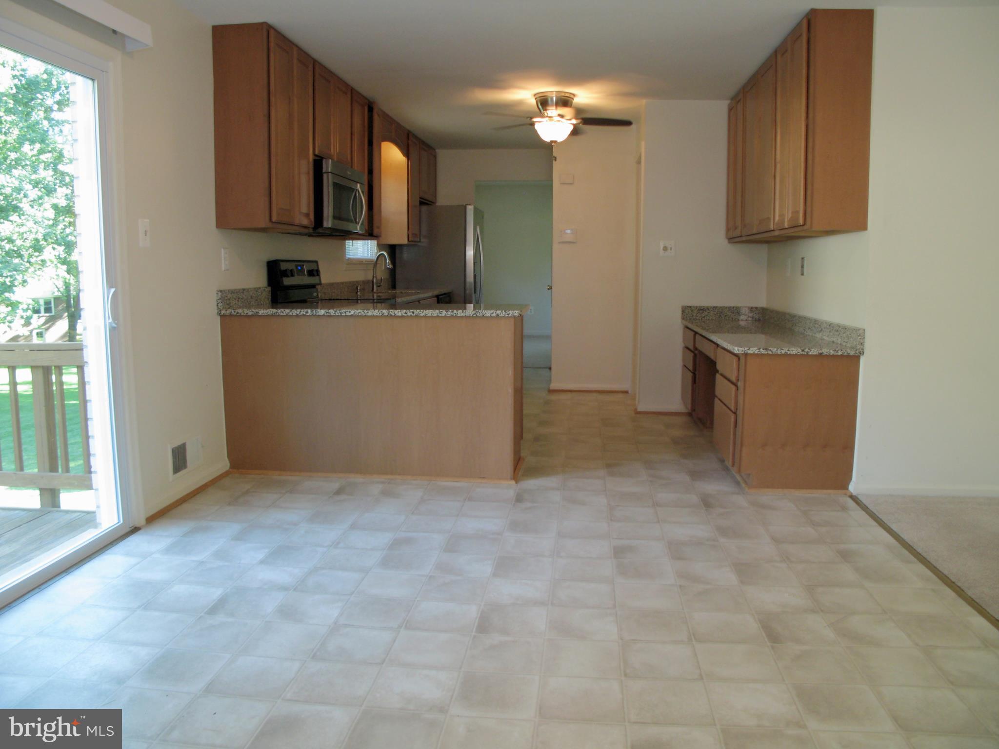 6970 Conservation Drive Springfield, VA 22153 - Photo 8 of 30 Breakfast Room & Kitchen