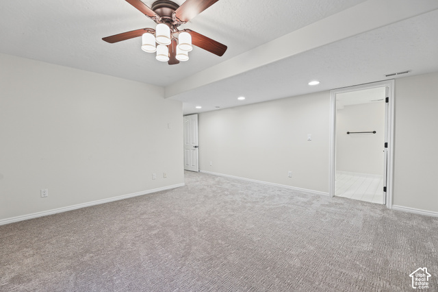 10664 Trail Ridge Circle Sandy, UT 84092 - Photo 55 of 113 Spacious room with gray carpet flooring and recessed lighting