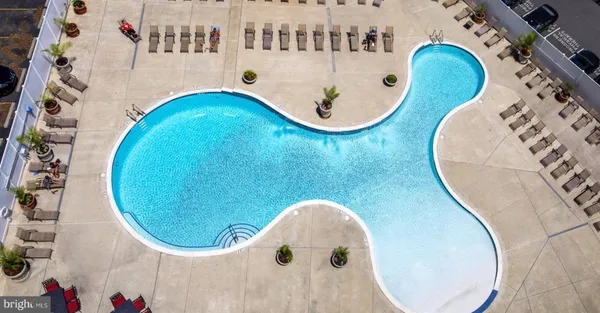 an aerial view of a swimming pool with a mirror