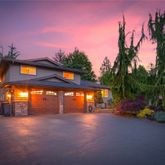 a view of a street with houses on both side of it