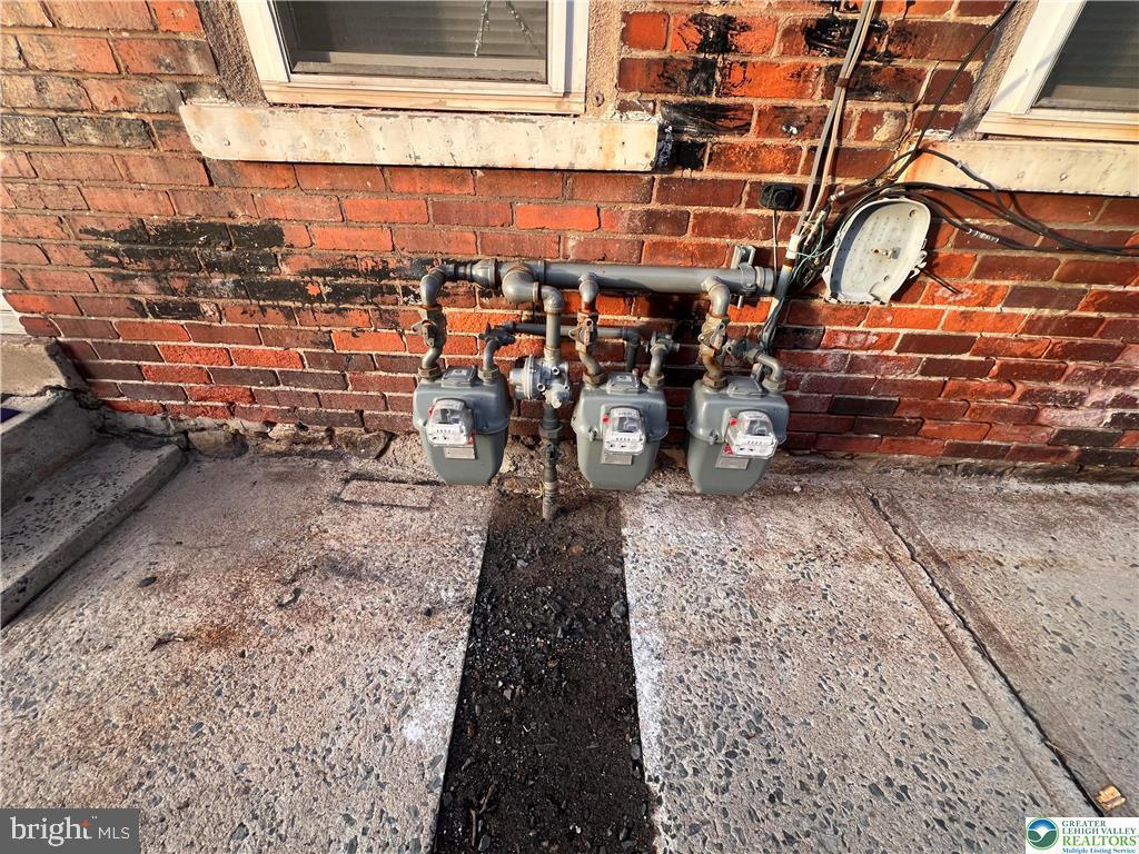 735 Laufer Street Bethlehem, PA 18015 - Photo 15 of 22 a view of a chairs and bench in a yard