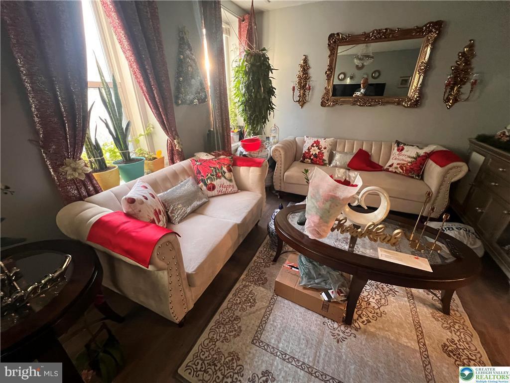 735 Laufer Street Bethlehem, PA 18015 - Photo 4 of 22 a living room with furniture and a window