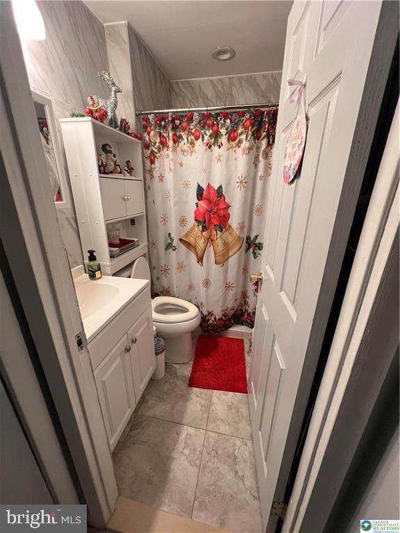 735 Laufer Street Bethlehem, PA 18015 - Photo 8 of 22 a bathroom with a sink toilet and shower