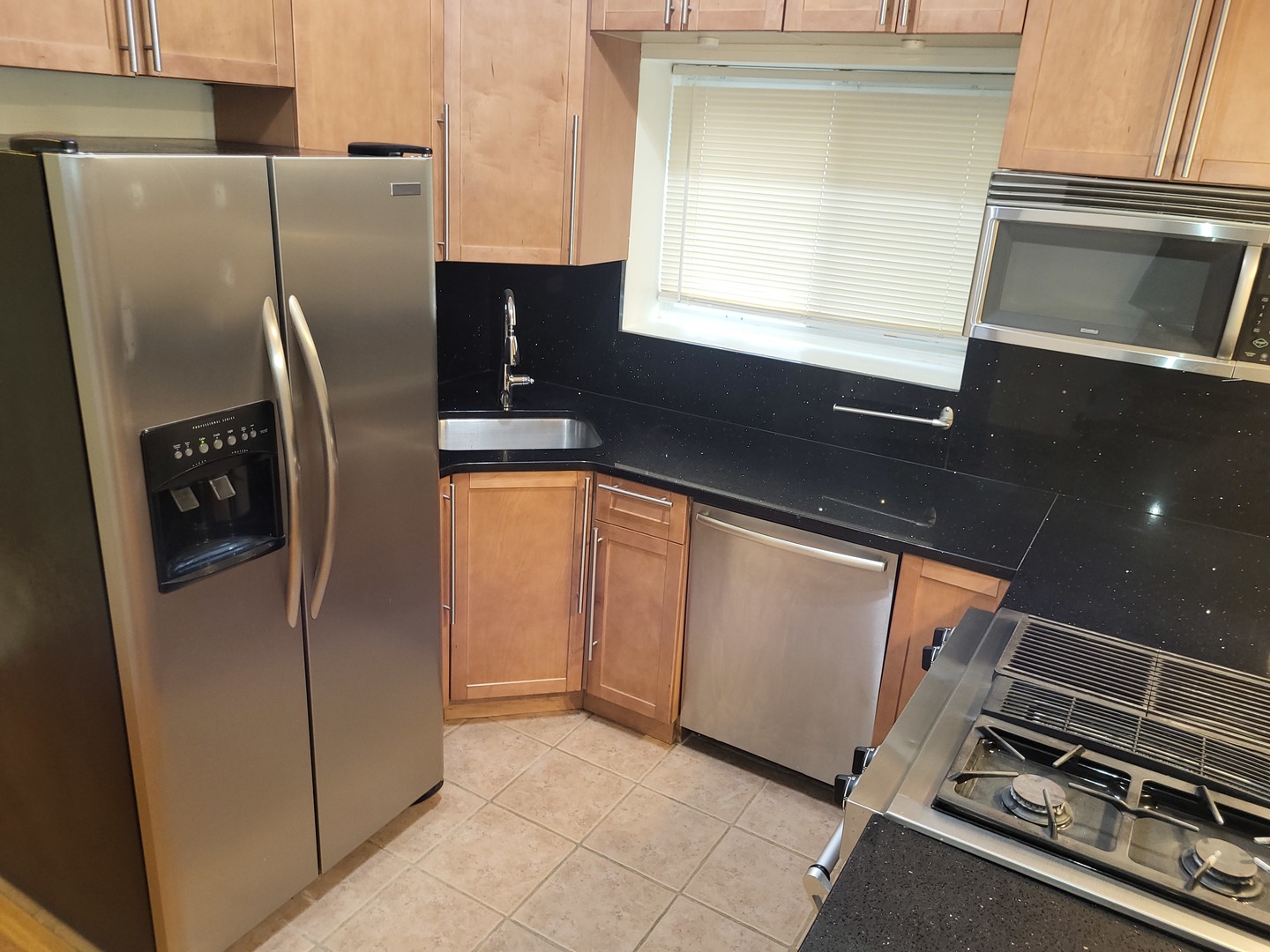 Undisclosed Address Chicago, IL 60622 - Photo 5 of 15 a kitchen with a refrigerator and a sink
