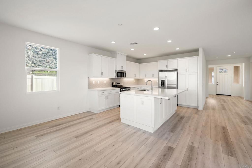 5384 Viewstone Court Hemet, CA 92545 - Photo 12 of 47 a view of kitchen with wooden floor