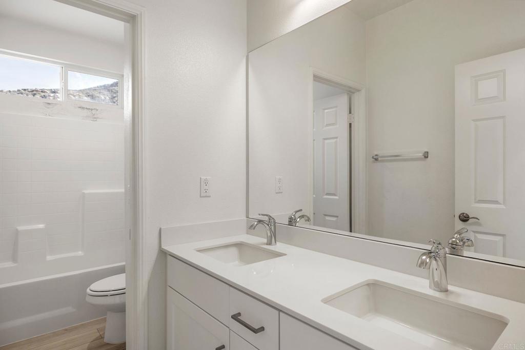 5384 Viewstone Court Hemet, CA 92545 - Photo 24 of 47 a bathroom with a sink toilet and shower