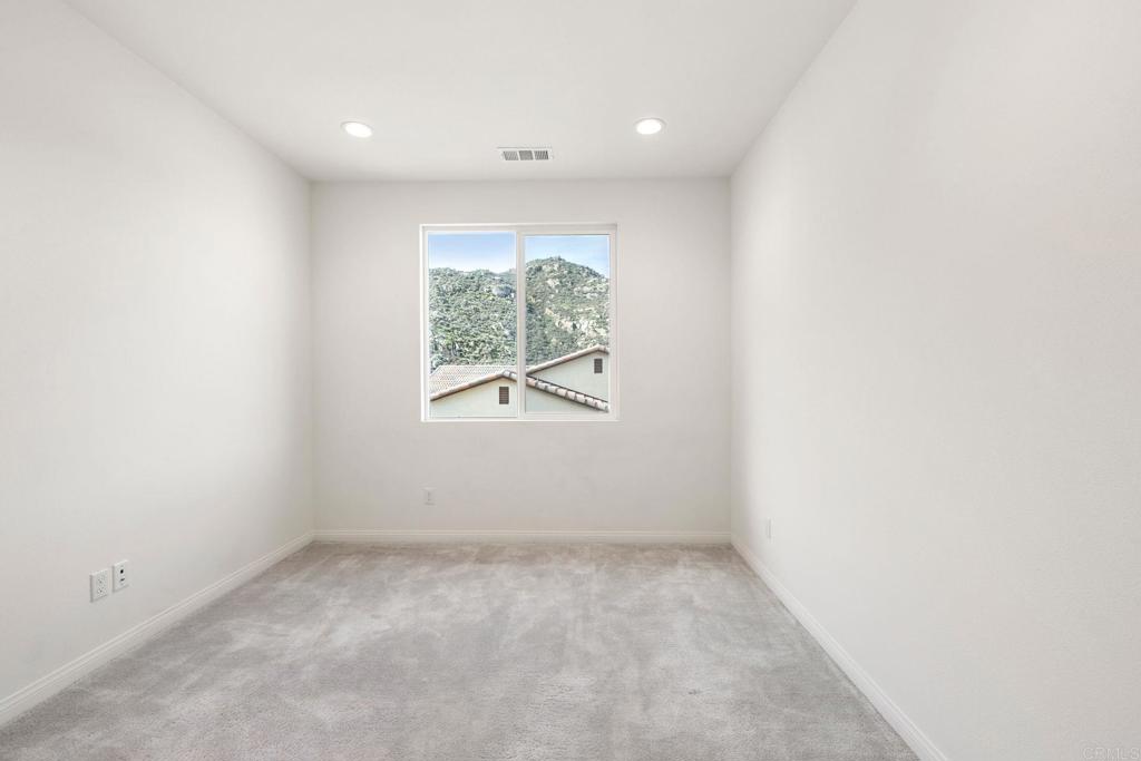 5384 Viewstone Court Hemet, CA 92545 - Photo 25 of 47 an empty room with windows