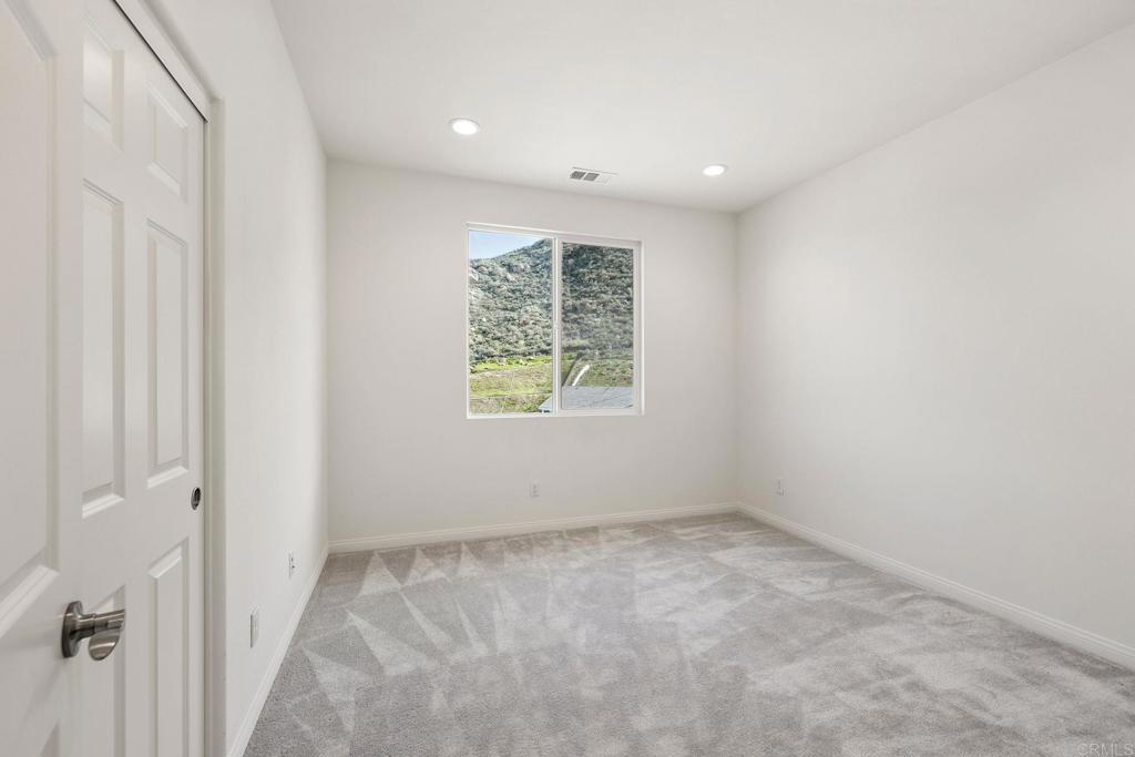 5384 Viewstone Court Hemet, CA 92545 - Photo 26 of 47 an empty room with windows