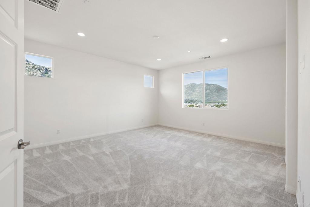 5384 Viewstone Court Hemet, CA 92545 - Photo 27 of 47 an empty room with a window