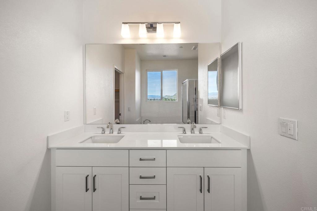 5384 Viewstone Court Hemet, CA 92545 - Photo 30 of 47 a bathroom with a sink and a mirror