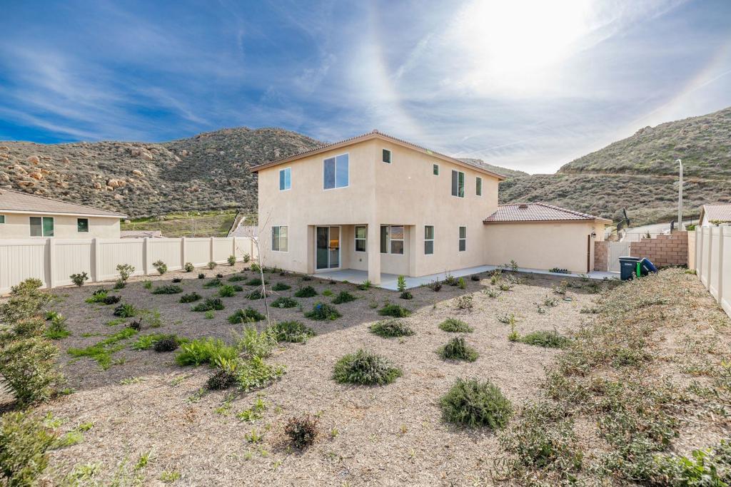 5384 Viewstone Court Hemet, CA 92545 - Photo 34 of 47 a view of a dry house with a yard