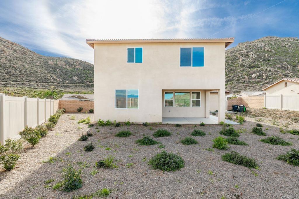 5384 Viewstone Court Hemet, CA 92545 - Photo 38 of 47 a front view of a house with a yard