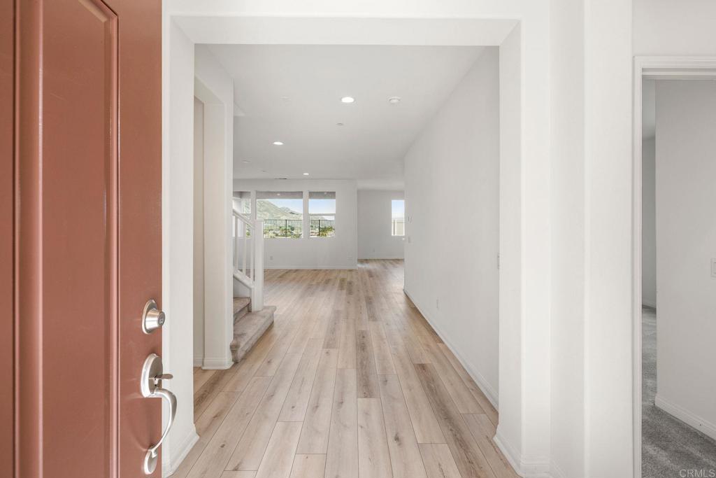 5384 Viewstone Court Hemet, CA 92545 - Photo 4 of 47 a view of wooden floor in a gallery