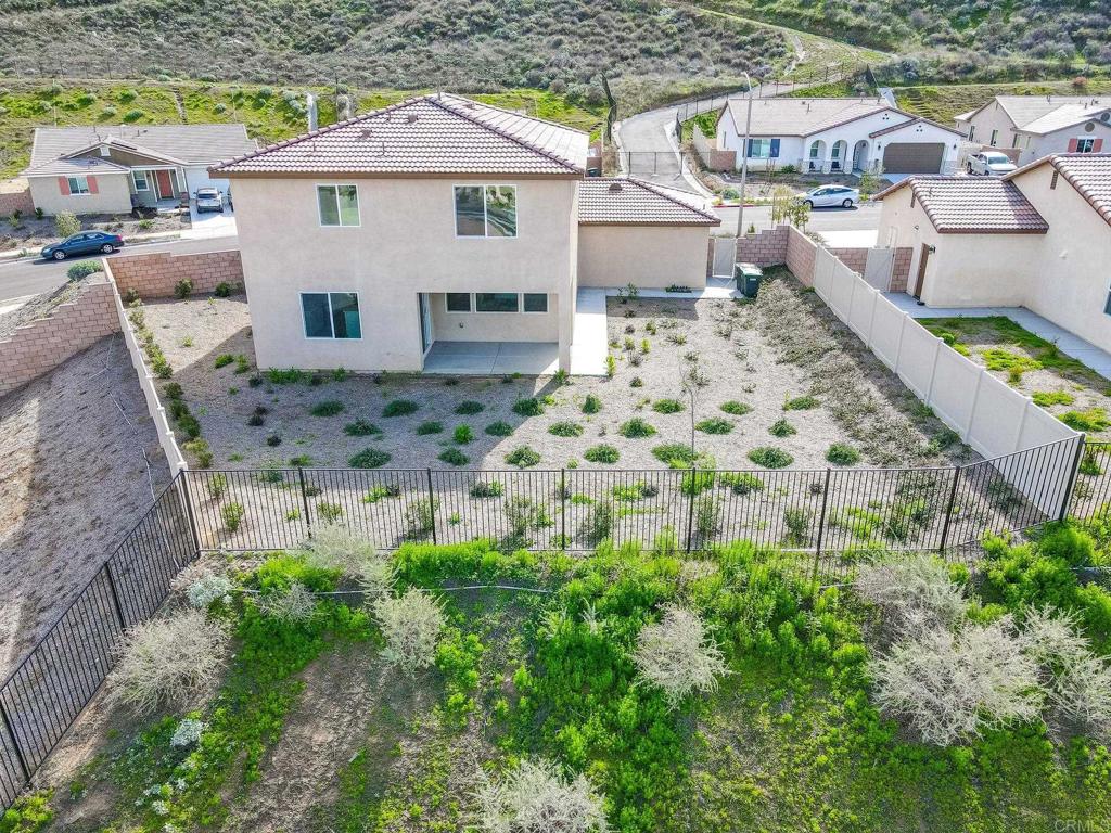 5384 Viewstone Court Hemet, CA 92545 - Photo 43 of 47 a aerial view of a house with a yard and potted plants