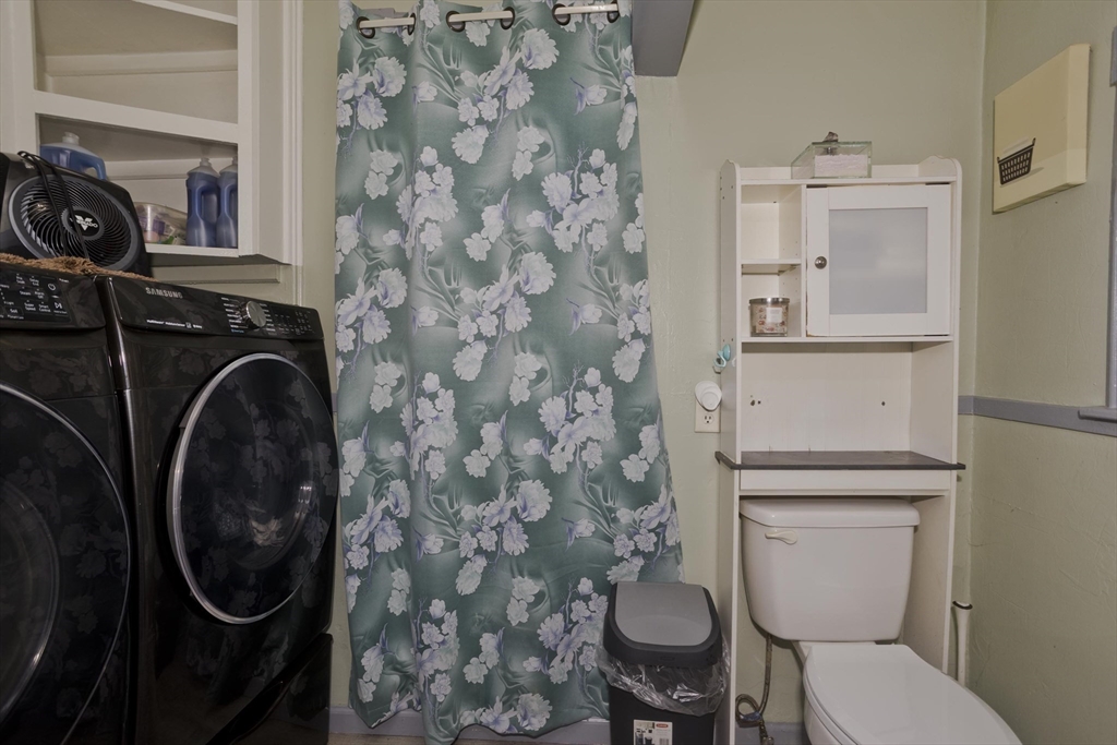 41 Embury Street Springfield, MA 01109 - Photo 11 of 41 a bathroom with a toilet and a sink
