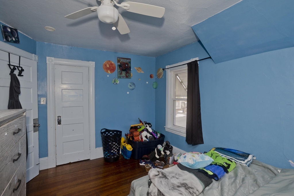 41 Embury Street Springfield, MA 01109 - Photo 23 of 41 a bedroom with bed and a window
