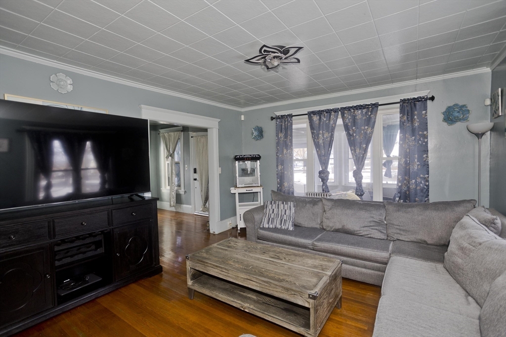 41 Embury Street Springfield, MA 01109 - Photo 37 of 41 a living room with furniture and a flat screen tv