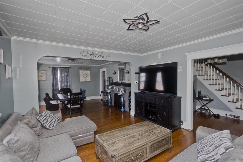 41 Embury Street Springfield, MA 01109 - Photo 39 of 41 a living room with furniture and a flat screen tv