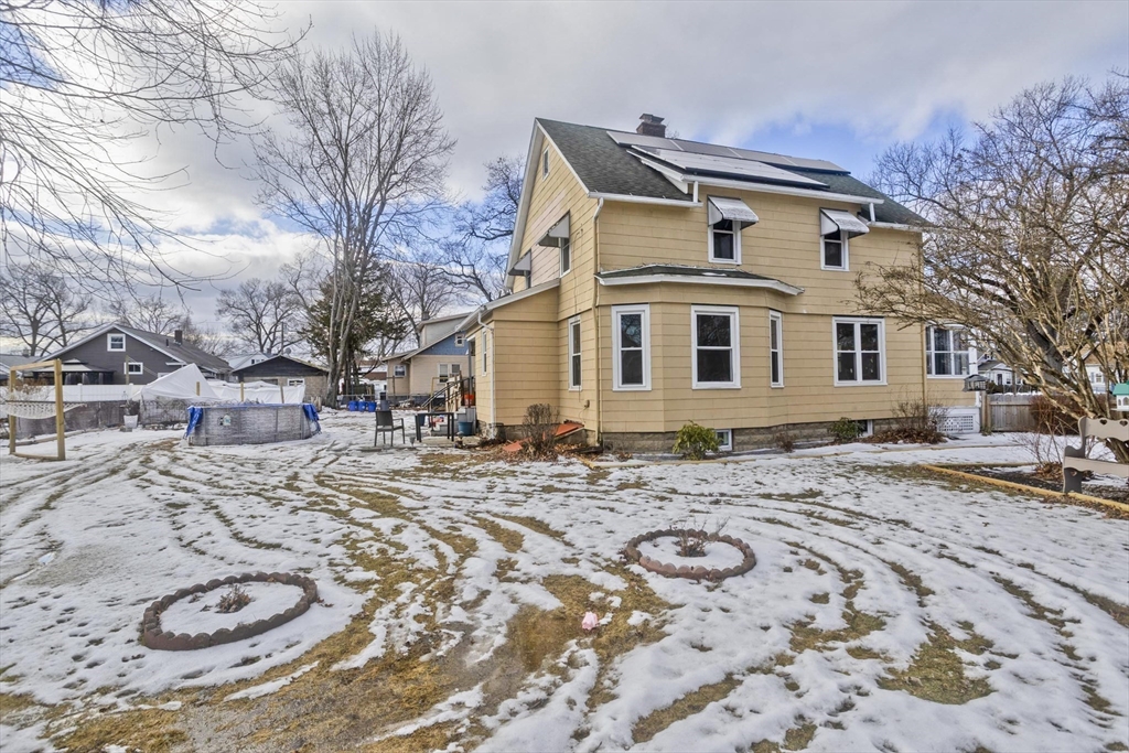 41 Embury Street Springfield, MA 01109 - Photo 9 of 41 a front view of a house with a yard