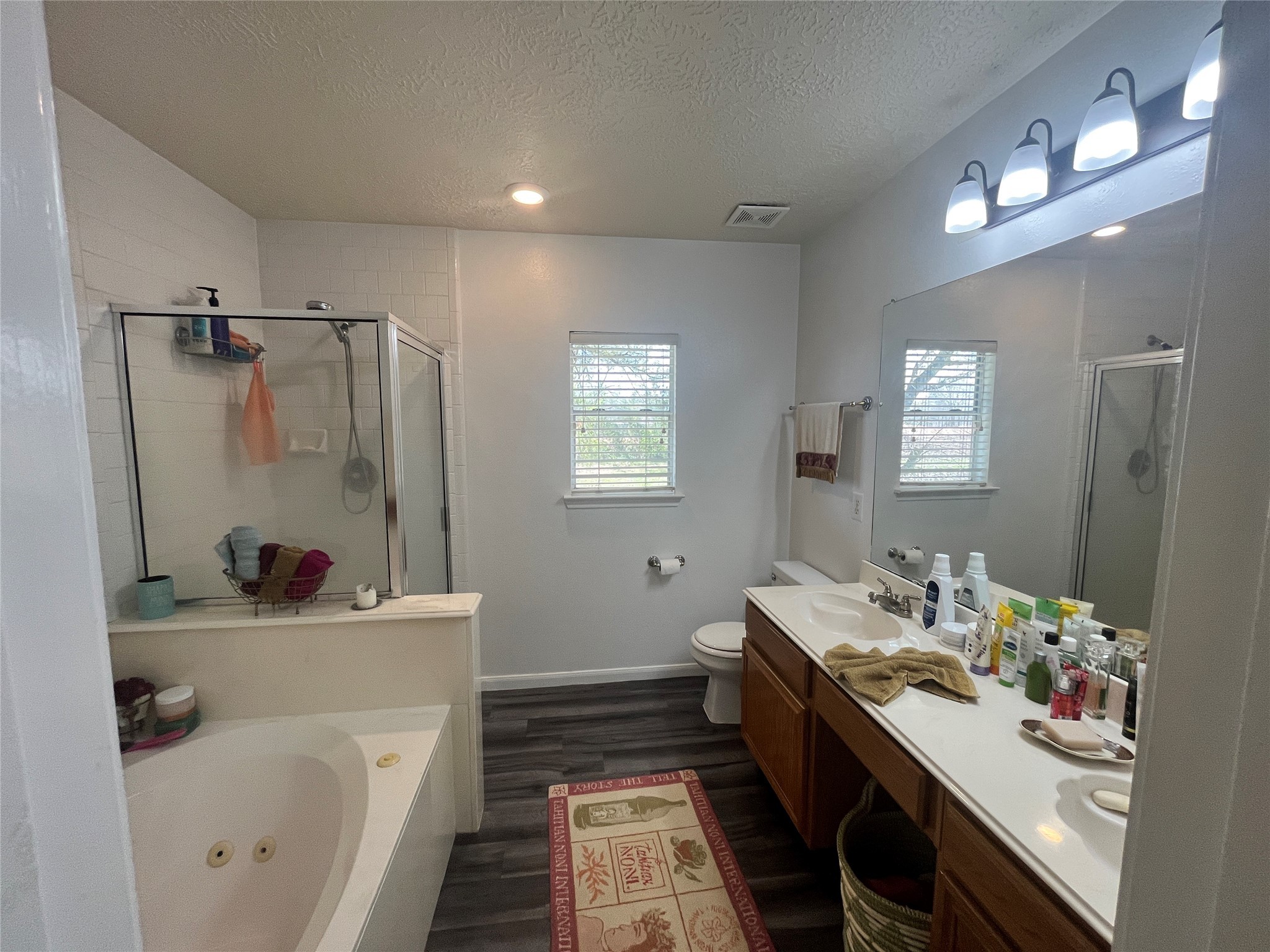 28723 Sedgefield Street Spring, TX 77386 - Photo 14 of 27 a bathroom with a sink double vanity tub and shower