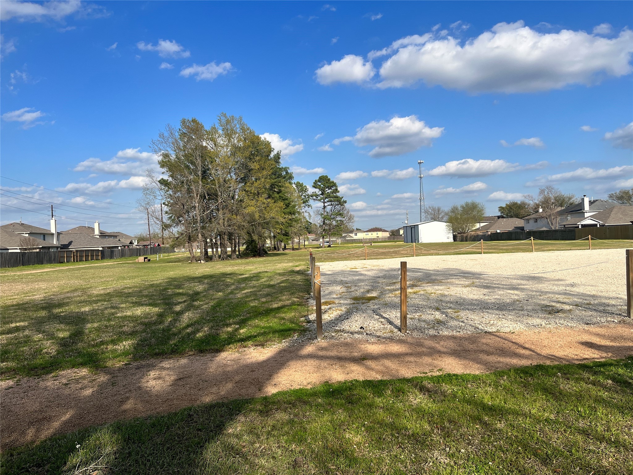 28723 Sedgefield Street Spring, TX 77386 - Photo 21 of 27 a view of a lake with houses in the background