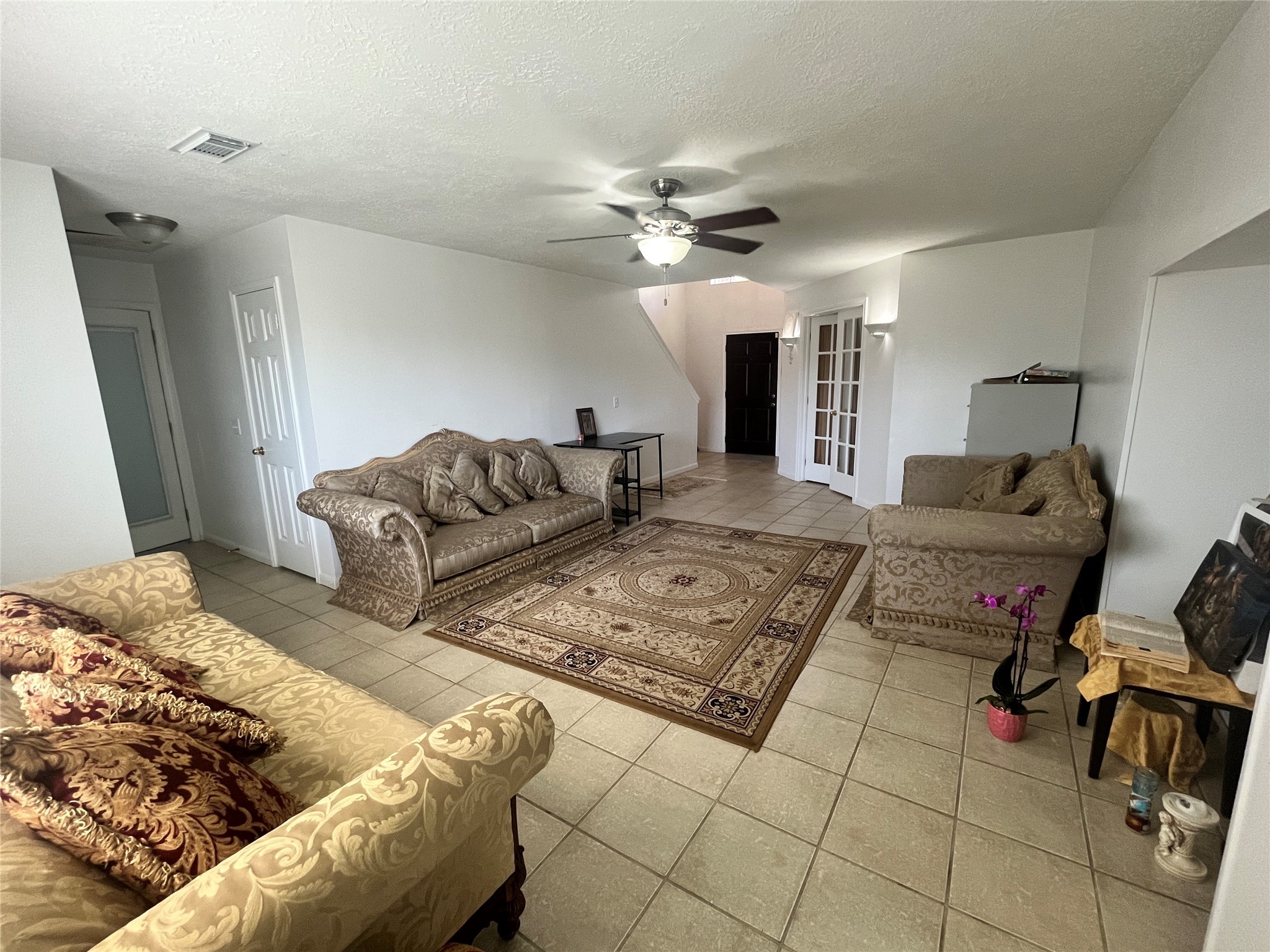 28723 Sedgefield Street Spring, TX 77386 - Photo 7 of 27 a living room with furniture and a rug