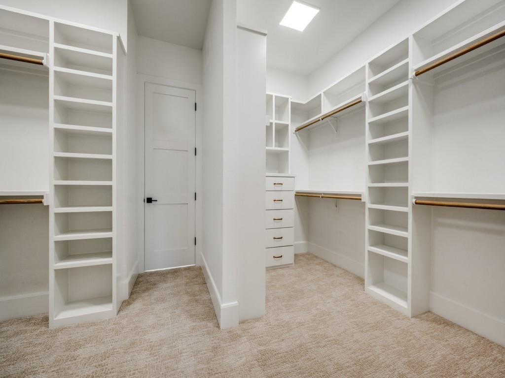 301 Fairmount Court Denton, TX 76210 - Photo 14 of 28 a view of an empty walk in closet