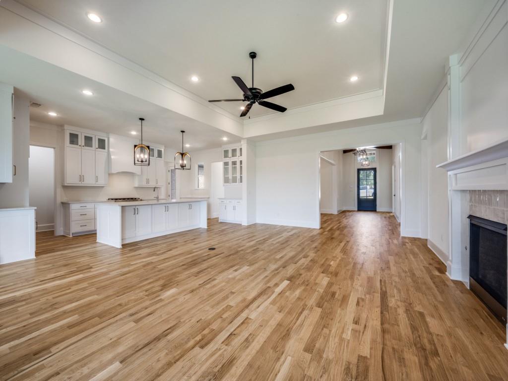 301 Fairmount Court Denton, TX 76210 - Photo 7 of 28 a view of kitchen with cabinets and wooden floor