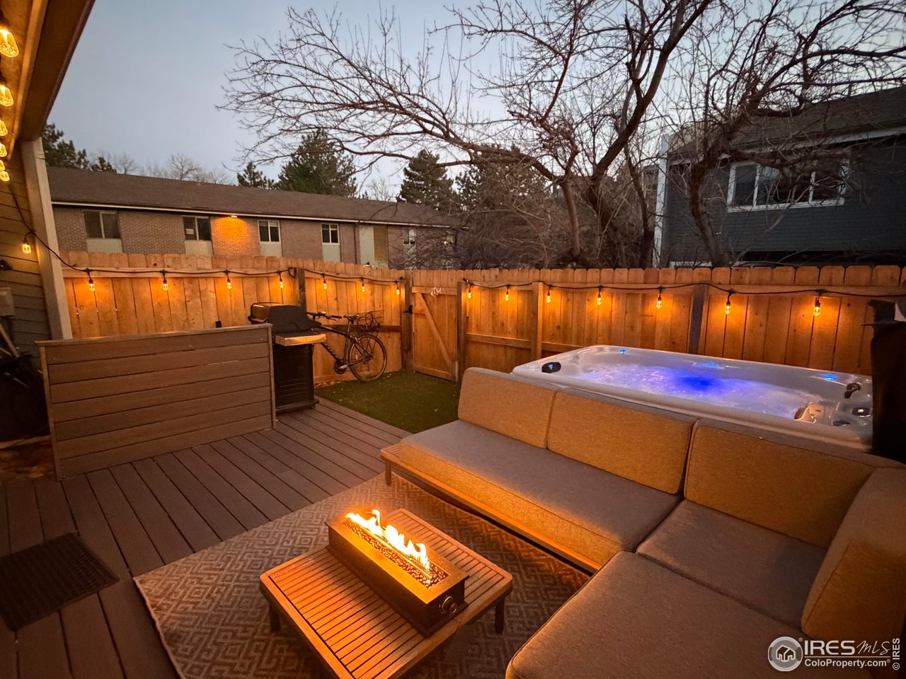 1749 Alpine Avenue, Unit 10 Boulder, CO 80304 - Photo 32 of 40 Fire pit and hot tub combine for the ultimate cozy patio retreat